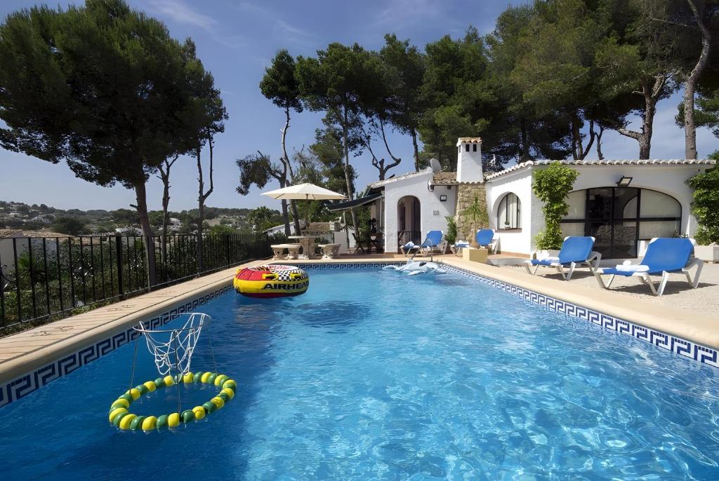 Exterior view of the villa and pool